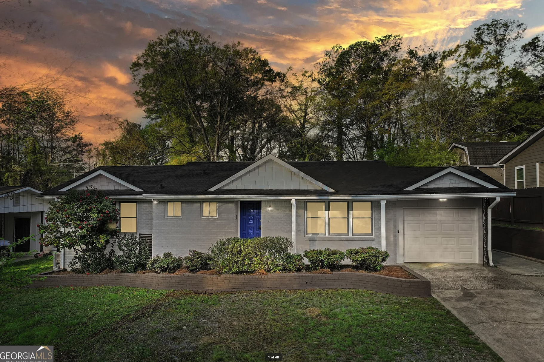 Entry-level renovation — renovated exterior at twilight